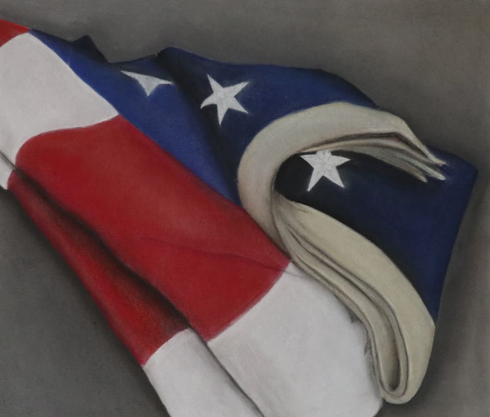 Charcoal drawing of folded American flag.