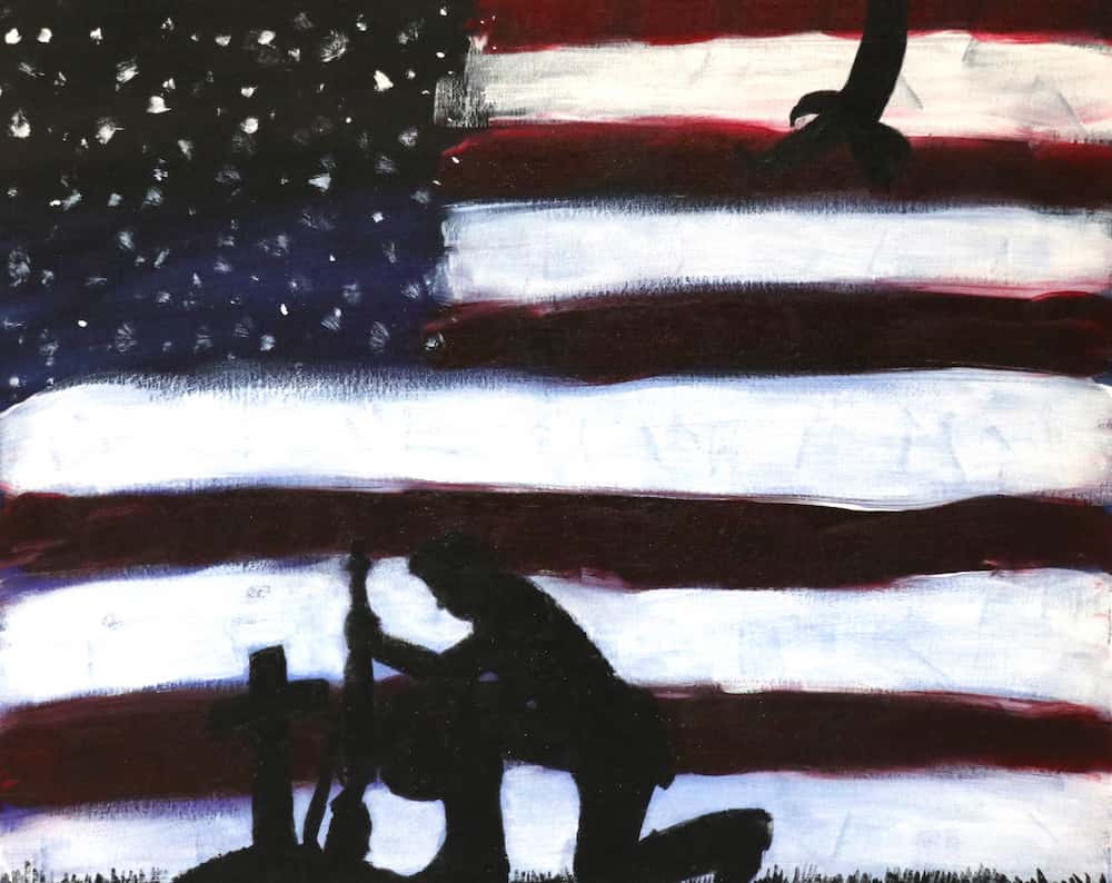 Painting of soldier kneeling over grave with American flag in background